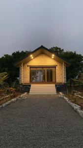 a small house with lights on top of it at Gulab Bagh Jawai in Jawāi Bāndh