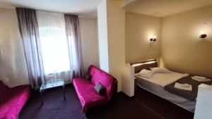 En eller flere senge i et værelse på Hotel Imperial + 57 billeder