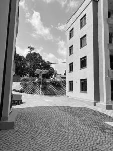 a black and white photo of a building at Elite Haven in Masaka