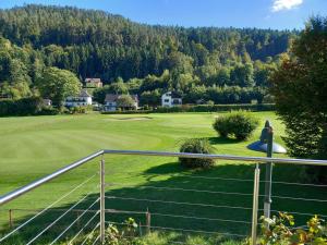 a view of the golf course at a resort at Ferienhaus in Maria Wörth