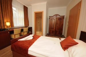 Letto o letti in una camera di Hotel Encian