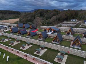 an aerial view of a resort with a row of lodges at Akcasehir Sosyal Tesisleri in Akçakoca