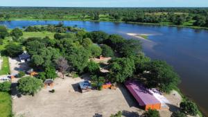 an aerial view of an island in the middle of a river at Edsam Lodge in Divundu +19 photos