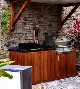 a kitchen with a counter top with a grill at Tropical heaven in Les Trois-Îlets