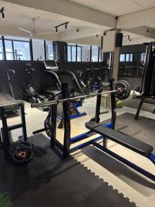 a gym with a bunch of tread machines in it at Silver wings Kasauli in Kasauli