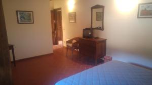 Postel nebo postele na pokoji v ubytování Agriturismo Francini