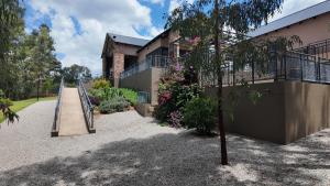 a house with a skateboard ramp in front of it at Villa 183 in Roodekrans