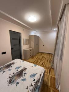 a bedroom with a bed in a room at Terrace house Jermuk in Jermuk