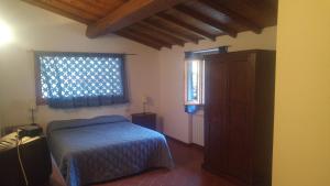 Postel nebo postele na pokoji v ubytování Agriturismo Francini