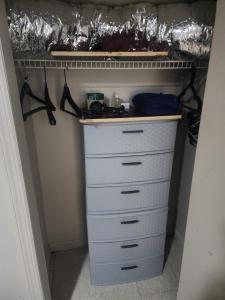 a closet with a chest of drawers at Bridgeport East Main in Bridgeport +4 photos