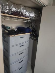 a closet with a stove and some drawers at Bridgeport East Main in Bridgeport
