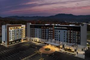 an aerial view of a hotel at night at Tempo By Hilton Pigeon Forge in Pigeon Forge
