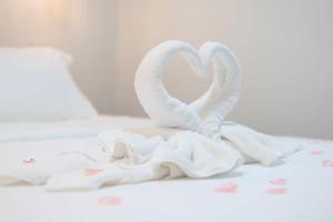 Giường trong phòng chung tại Rungarun Residence +3 ảnh