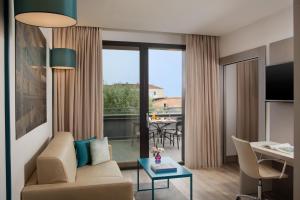 Телевизия и/или развлекателен център в NH Parma