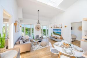 Et opholdsområde på FeWo Prora - Wellenblick inklusive Strandkorb + 14 billeder