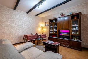 a living room with a couch and a table at Maison de Marino - B&Brother's rome in Marino