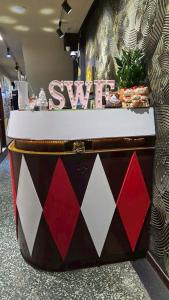 a large box sitting on the floor in a store at SWF hotel 淡水新五福旅館-新北市旅館編號067 in Tamsui