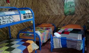 Postel nebo postele na pokoji v ubytování Hostal Familiar El Ángel Panamá B&B