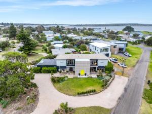 an aerial view of a house with a driveway at Sixty at Yellow Doors in Goolwa South