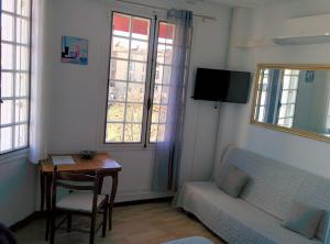 TV a/nebo společenská místnost v ubytování Hotel Araur