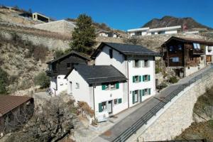 an aerial view of a building on a hill at Le Studio du Rhône in Saint-Léonard
