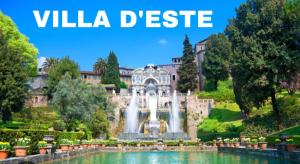 a park with a fountain in front of a villa desire at RoMi's house in Colonna