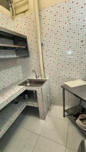 a bathroom with a sink in a room at San House TEN in Zipaquirá +11 photos