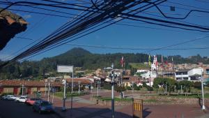 a view of a town with a mountain in the background at San House TEN in Zipaquirá