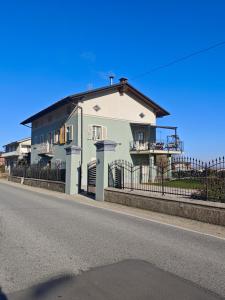a house on the side of a road at B&B Da Cavalot in Envie