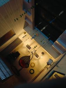 an overhead view of a room with a chair and a table at Hari Sharnam Residency in Mathura