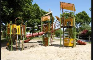 a playground in a park with a slide at Lambé in Pont-Aven