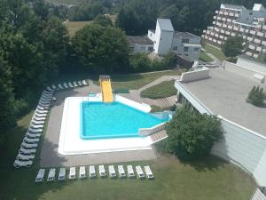 an overhead view of a swimming pool on a house at Sylva Apartment in Sankt Englmar