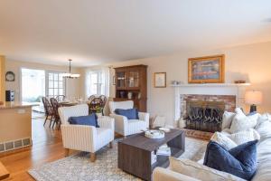 a living room filled with furniture and a fireplace at Spacious Home by Beach Dog Welcome in Brewster +27 photos