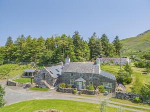 an aerial view of a large stone house at 4 Bed in Arthog oc-b31966 in Arthog