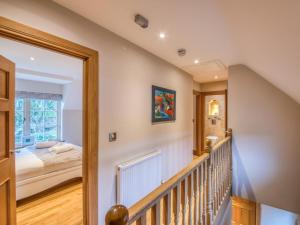 a staircase leading to a bedroom in a house at 2 Bed in Chathill oc-77990 in Ellingham
