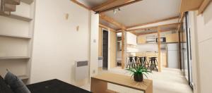 a living room with a table and some chairs at Chalet 3 étoiles - Piscine - ccbbgcc in Sauxillanges