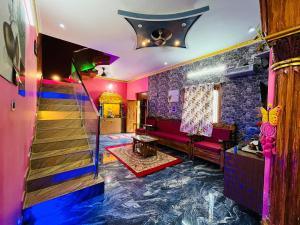 a living room with a floor covered in water at selvis casa in Pondicherry