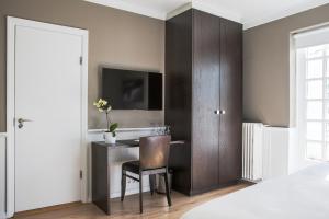 TV a/nebo společenská místnost v ubytování Hotel Ódinsvé