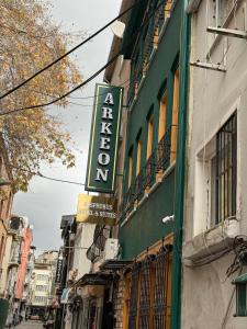 a sign for a restaurant on the side of a building at Arkeon Bosphorus Hotel & Suites in Istanbul
