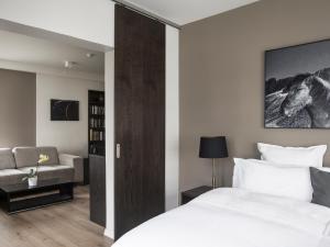 Postel nebo postele na pokoji v ubytování Hotel Ódinsvé