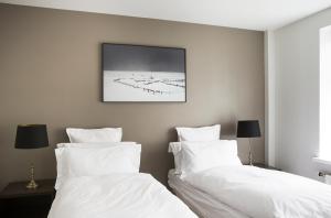 Postel nebo postele na pokoji v ubytování Hotel Ódinsvé