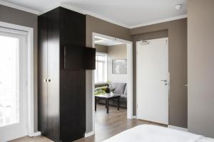Postel nebo postele na pokoji v ubytování Hotel Ódinsvé