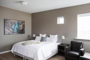 Postel nebo postele na pokoji v ubytování Hotel Ódinsvé
