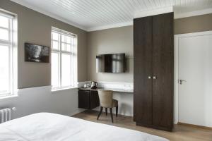 Kuchyň nebo kuchyňský kout v ubytování Hotel Ódinsvé