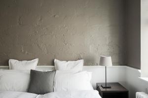 Postel nebo postele na pokoji v ubytování Hotel Ódinsvé