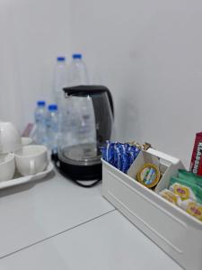 Příslušenství pro přípravu čaje a kávy v ubytování Al Gaith Retreat