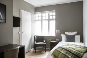Postel nebo postele na pokoji v ubytování Hotel Ódinsvé