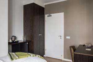 Postel nebo postele na pokoji v ubytování Hotel Ódinsvé