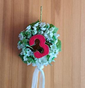 a number ornament hanging on a wall at LHMW19A03-FeWo-Seglerfruend-III in Westerbergen +1 photo