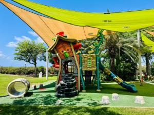 a playground in a park with a slide at גיל נכסים #2 in Caesarea